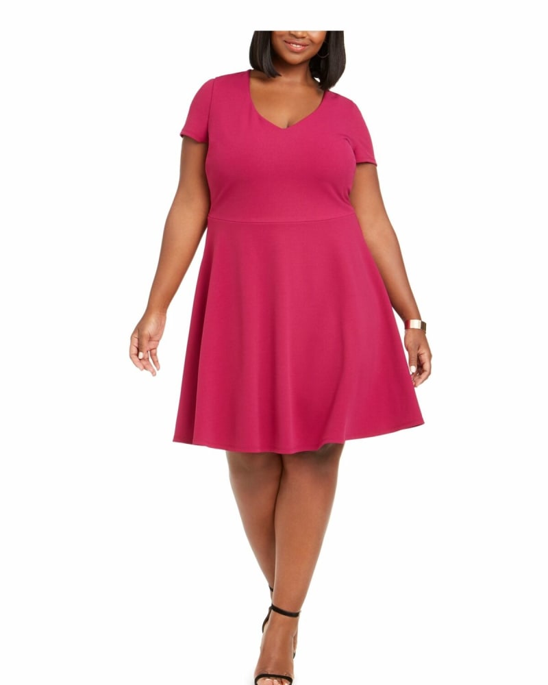 Front of a model wearing a size 16 B Darlin Women's Trendy Plus Size Bow-Back Skater Dress Purple Size 16 in Purple by B Darlin. | dia_product_style_image_id:313265
